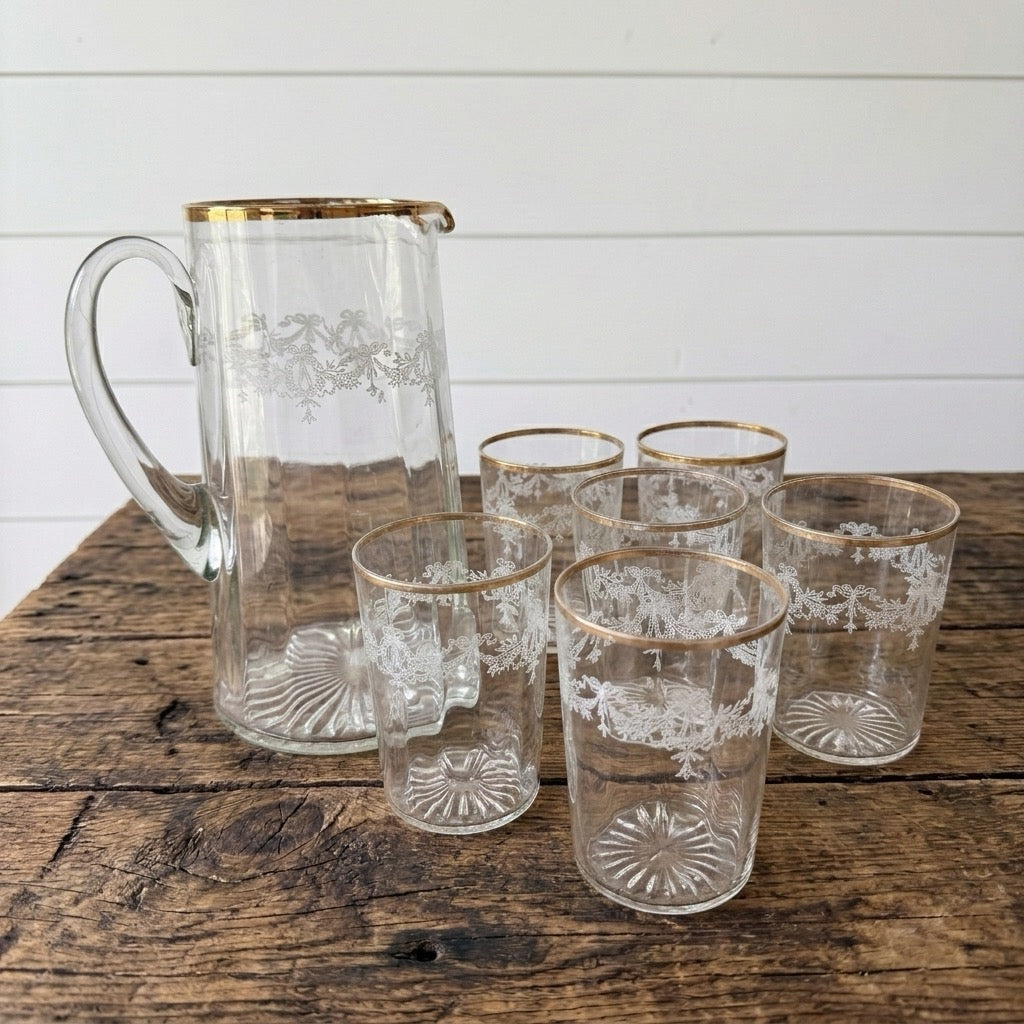 Vintage etched glass pitcher and six glasses