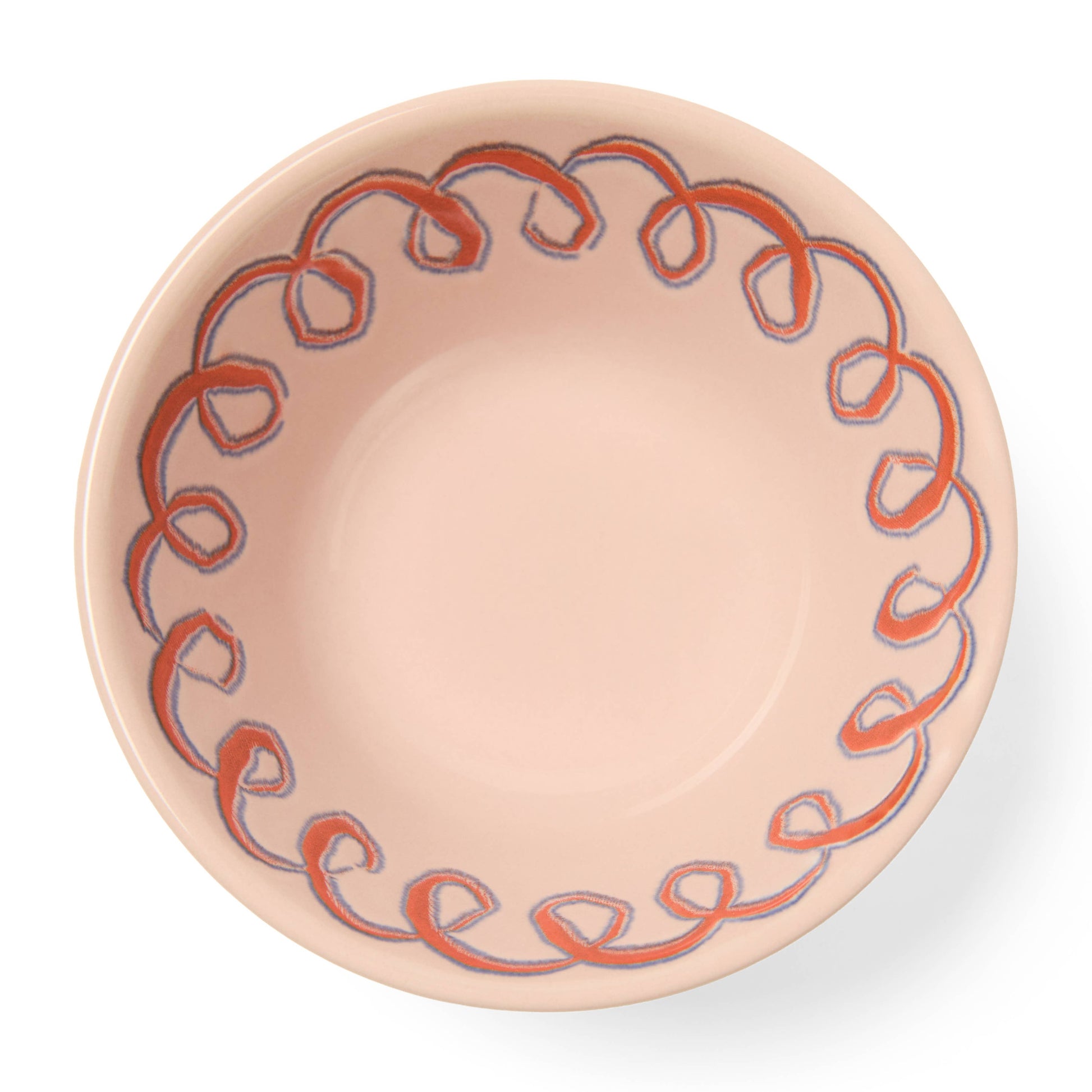 Ceramic bowl with decorative red pattern on a white background