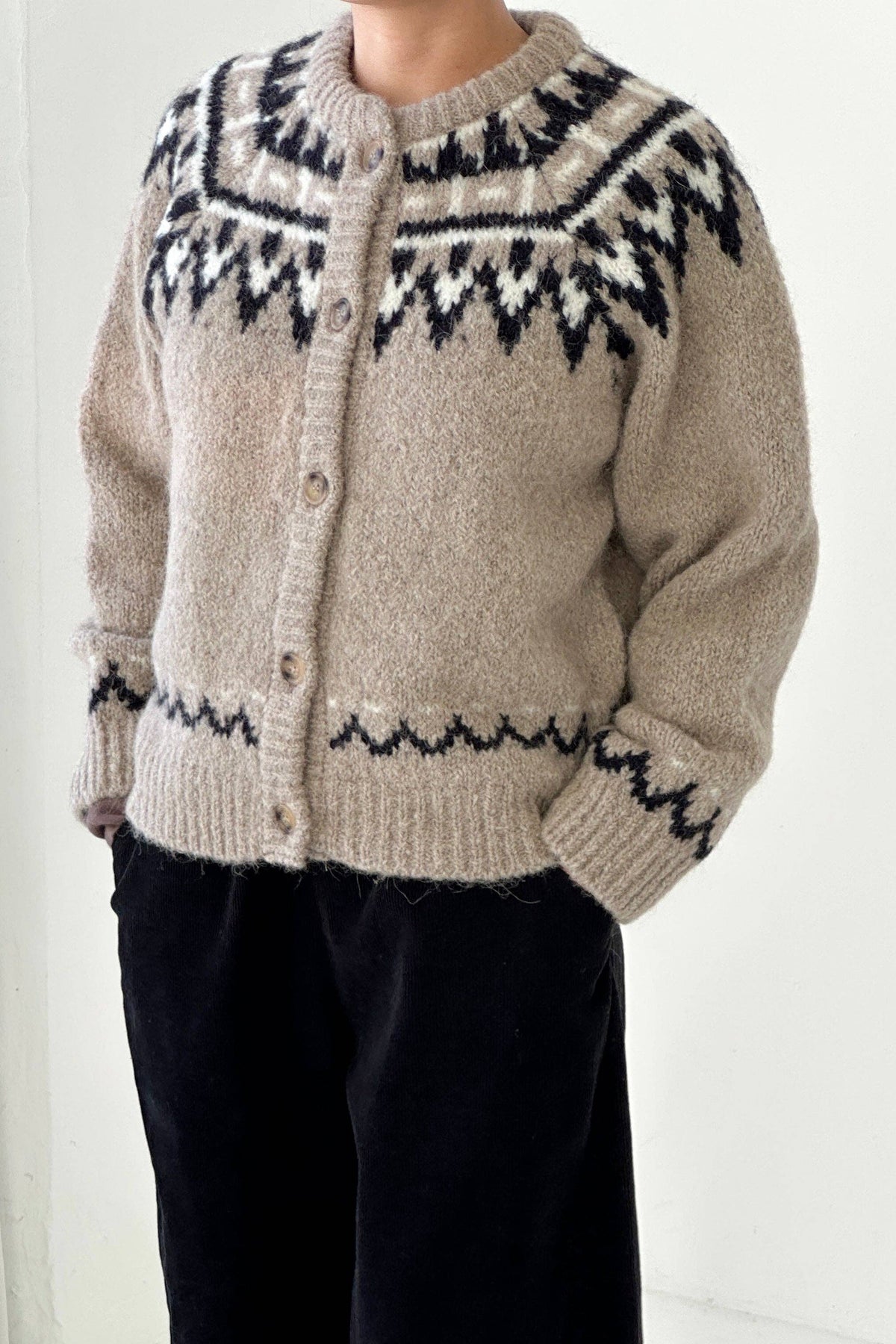 Beige cardigan with black and white 