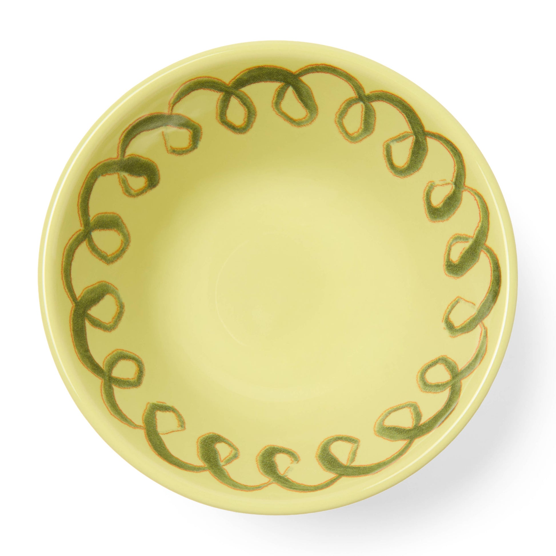 Yellow ceramic plate with green decorative border on a white background