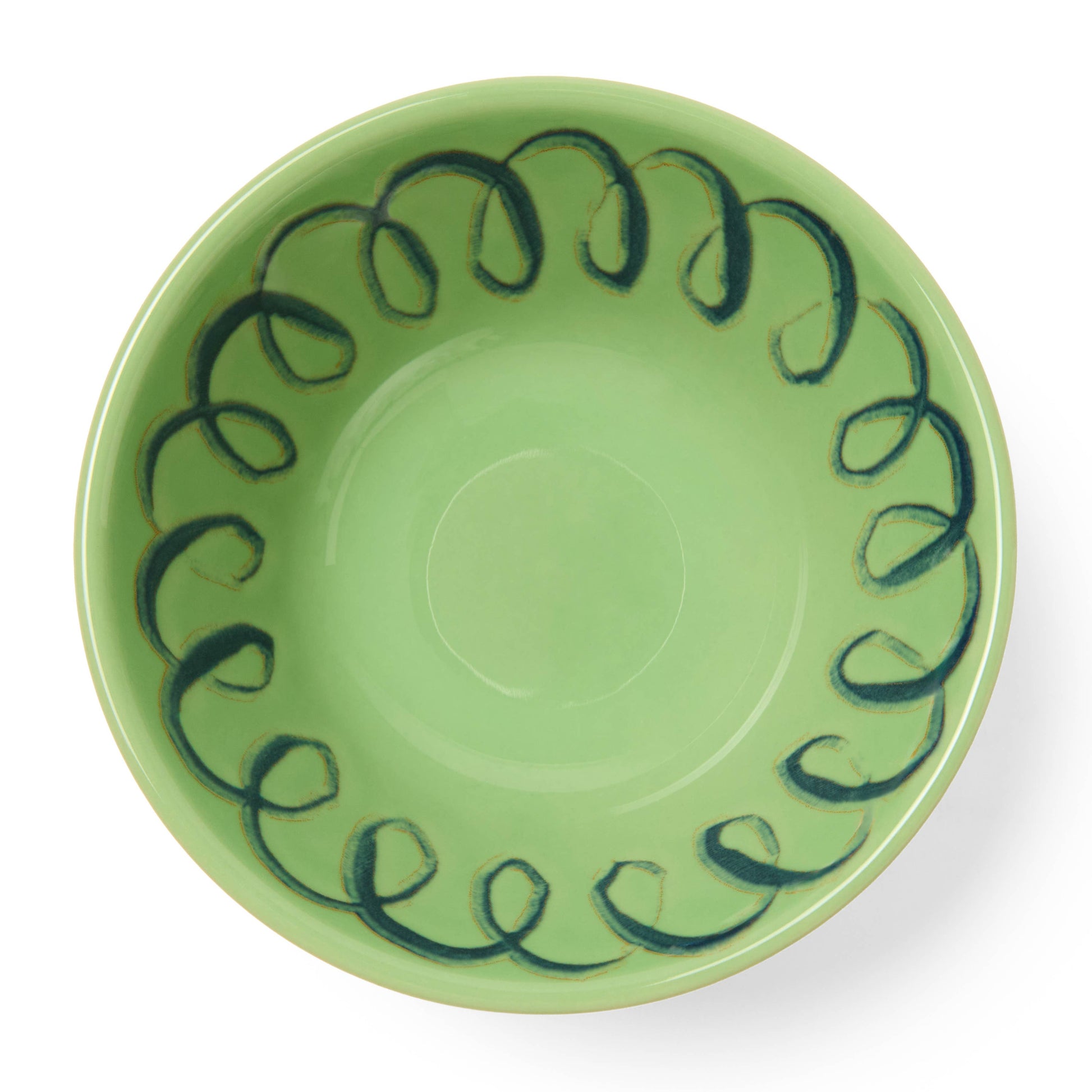 Green ceramic bowl with black decorative pattern on a white background