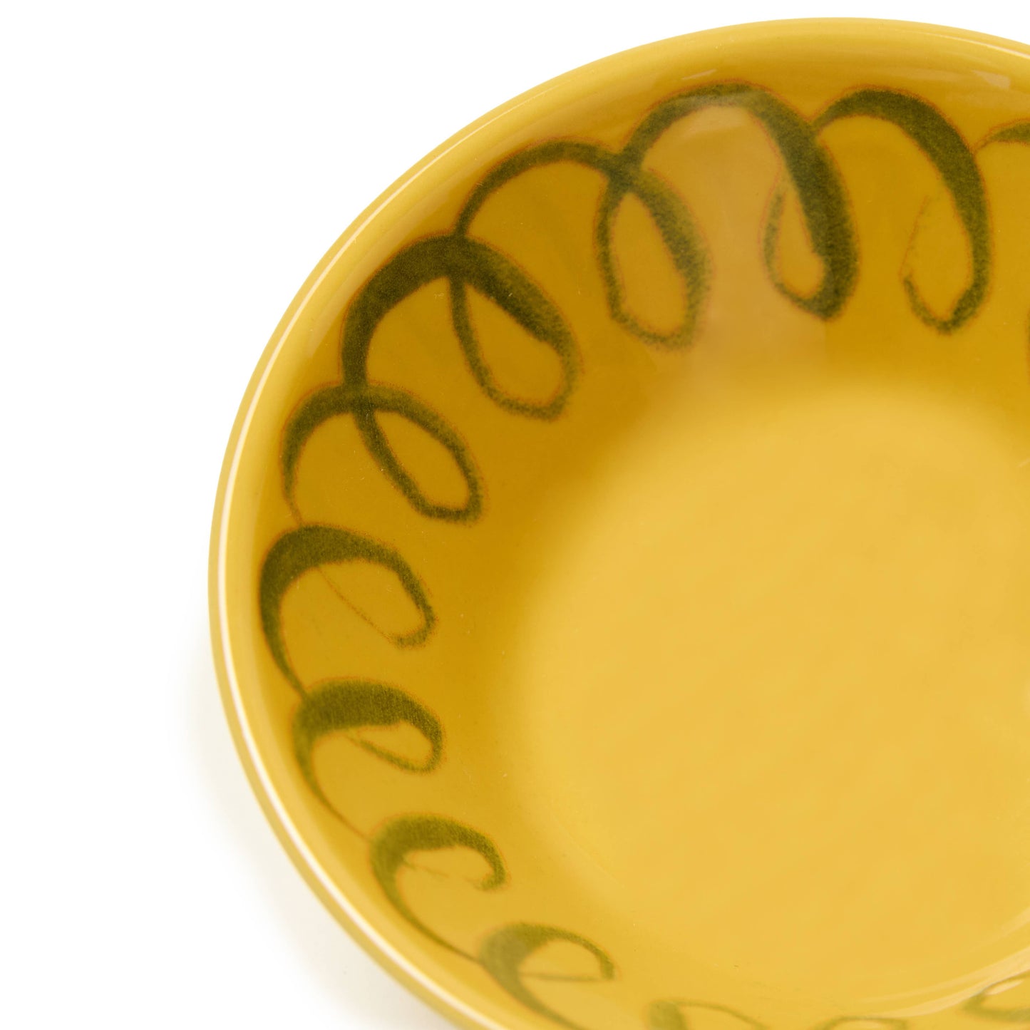 Yellow ceramic bowl with green decorative rim on a white background