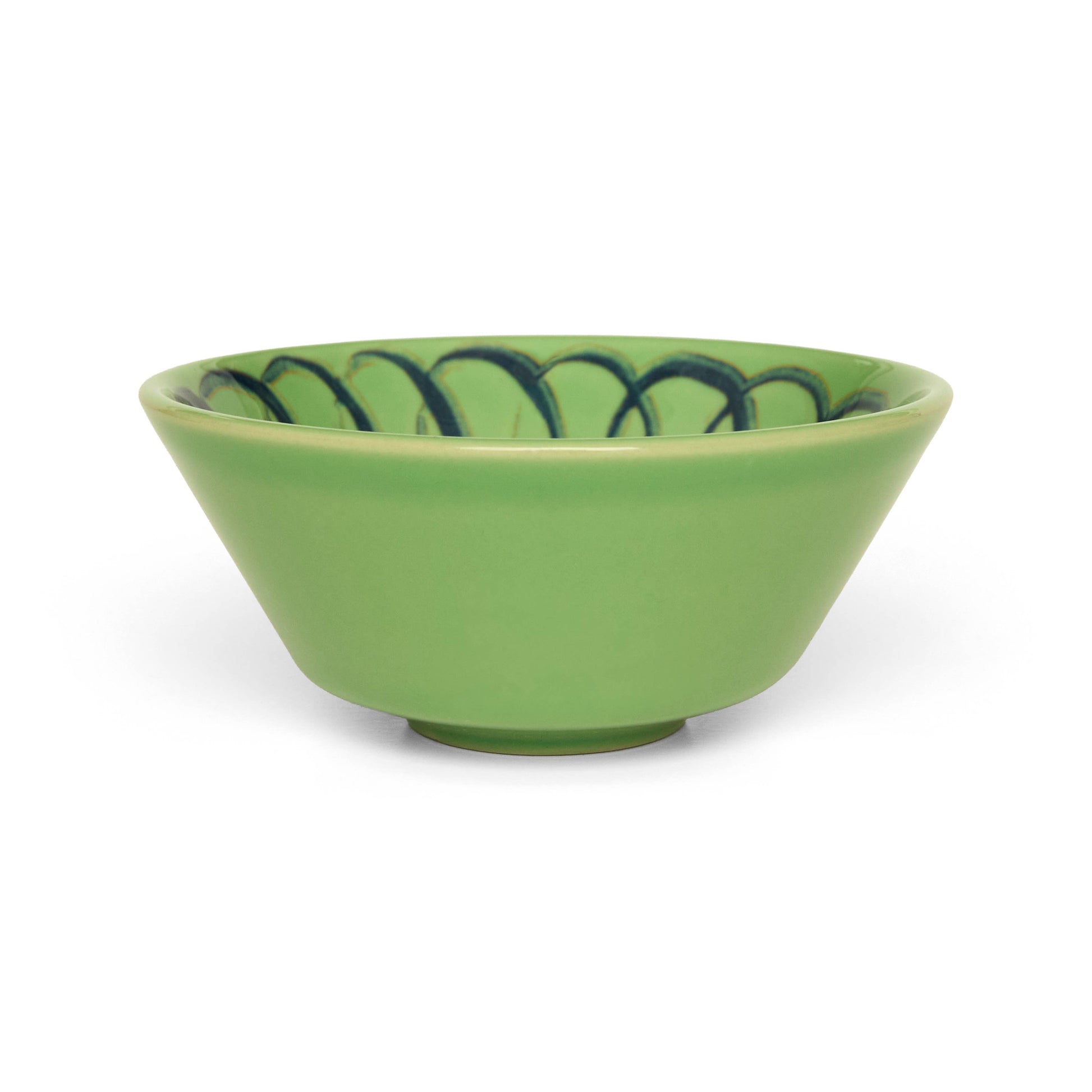 Green ceramic bowl with decorative blue pattern on a white background