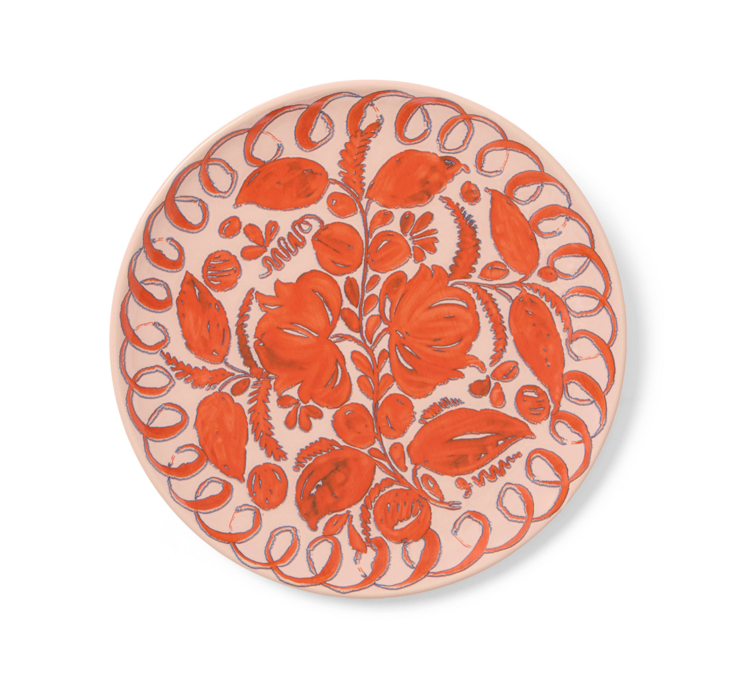 Round ceramic plate with orange floral pattern on a white background