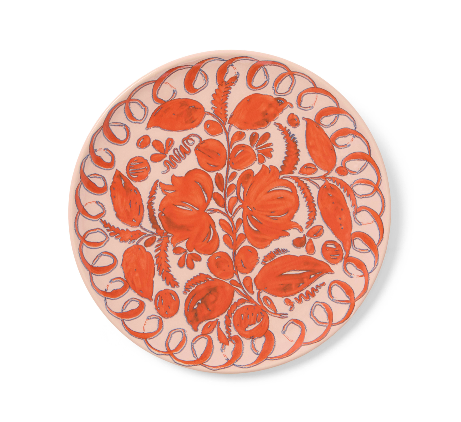 Round ceramic plate with orange floral pattern on a white background